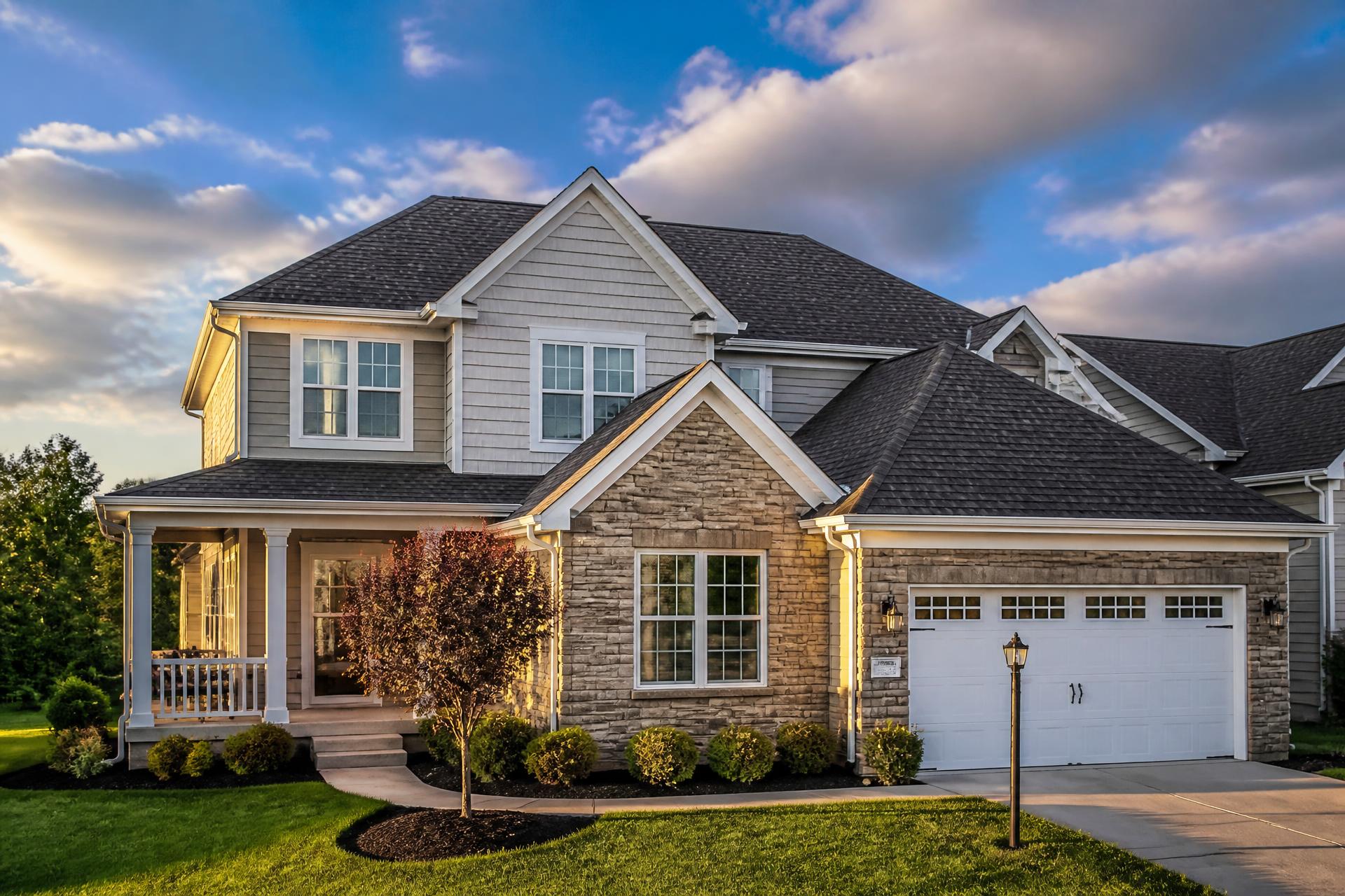 Newly installed architectural shingle roof on a two-story home near Troy, Ohio